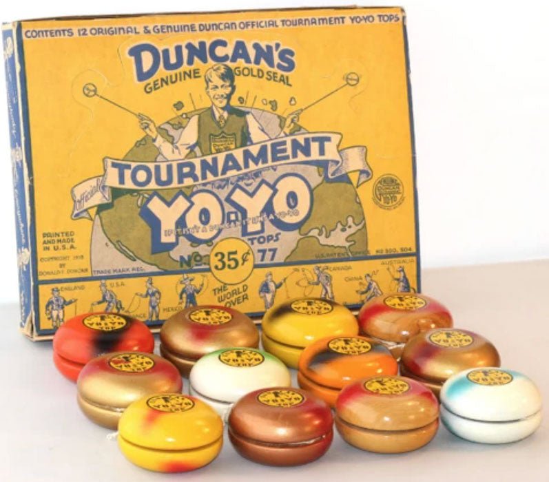 caja antigua duncans con yo-yos de distintos colores