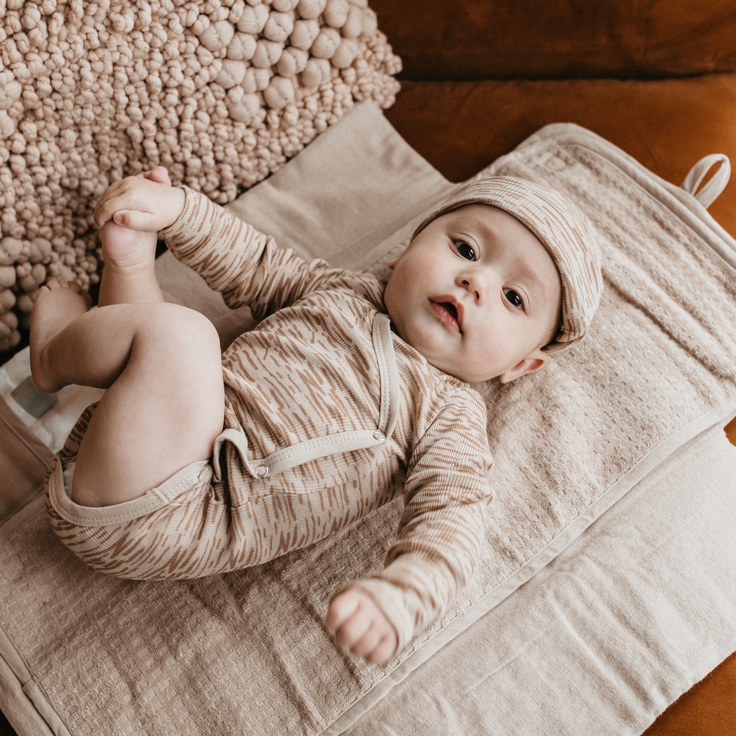 Bebe con cambiador Arena Snoozebaby | Chin Pum