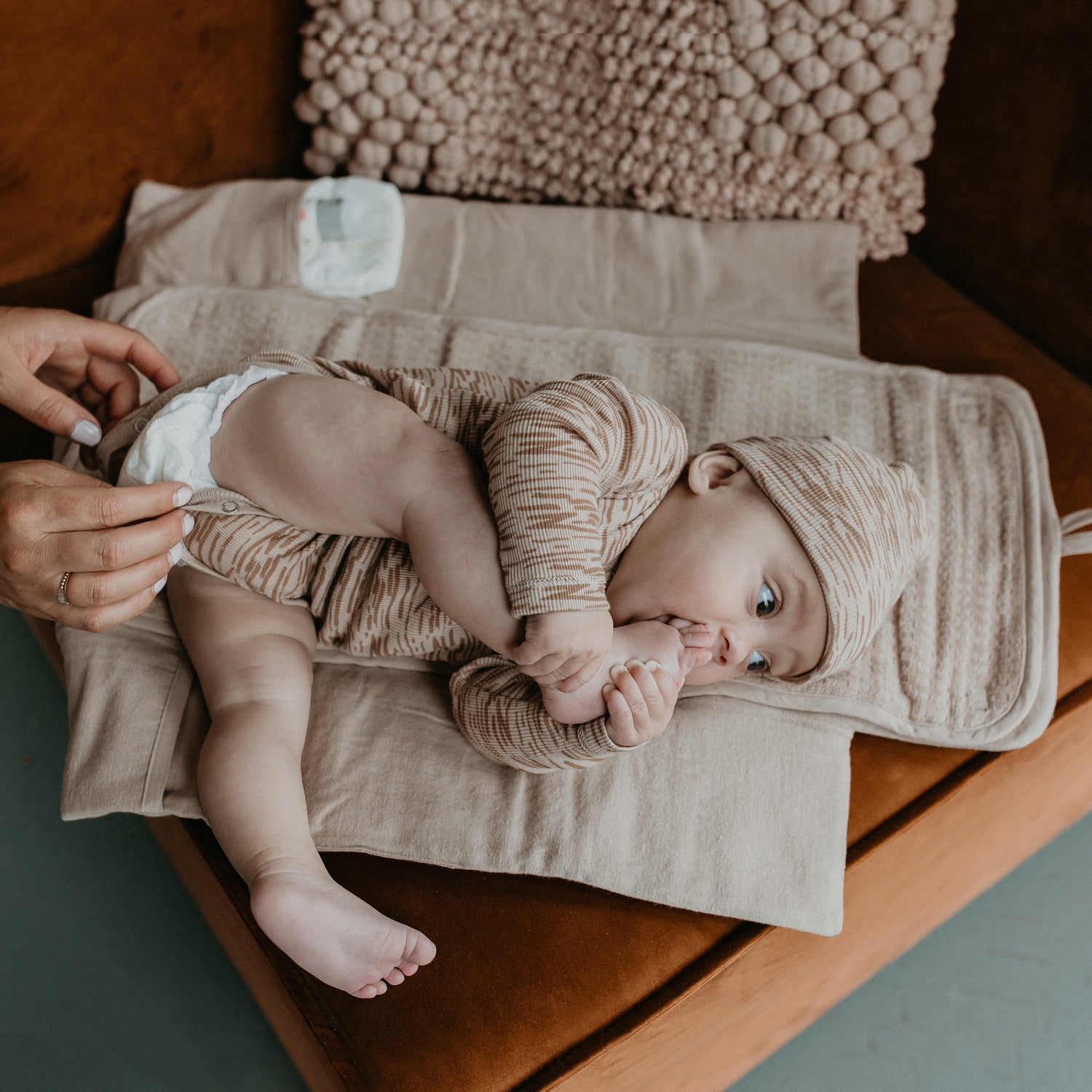 Bebe con cambiador Arena Snoozebaby | Chin Pum