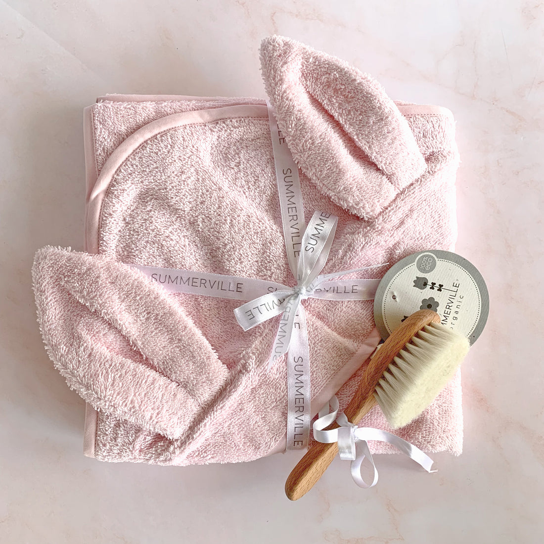 Pack toalla y cepillo bebé rosa | Chin Pum