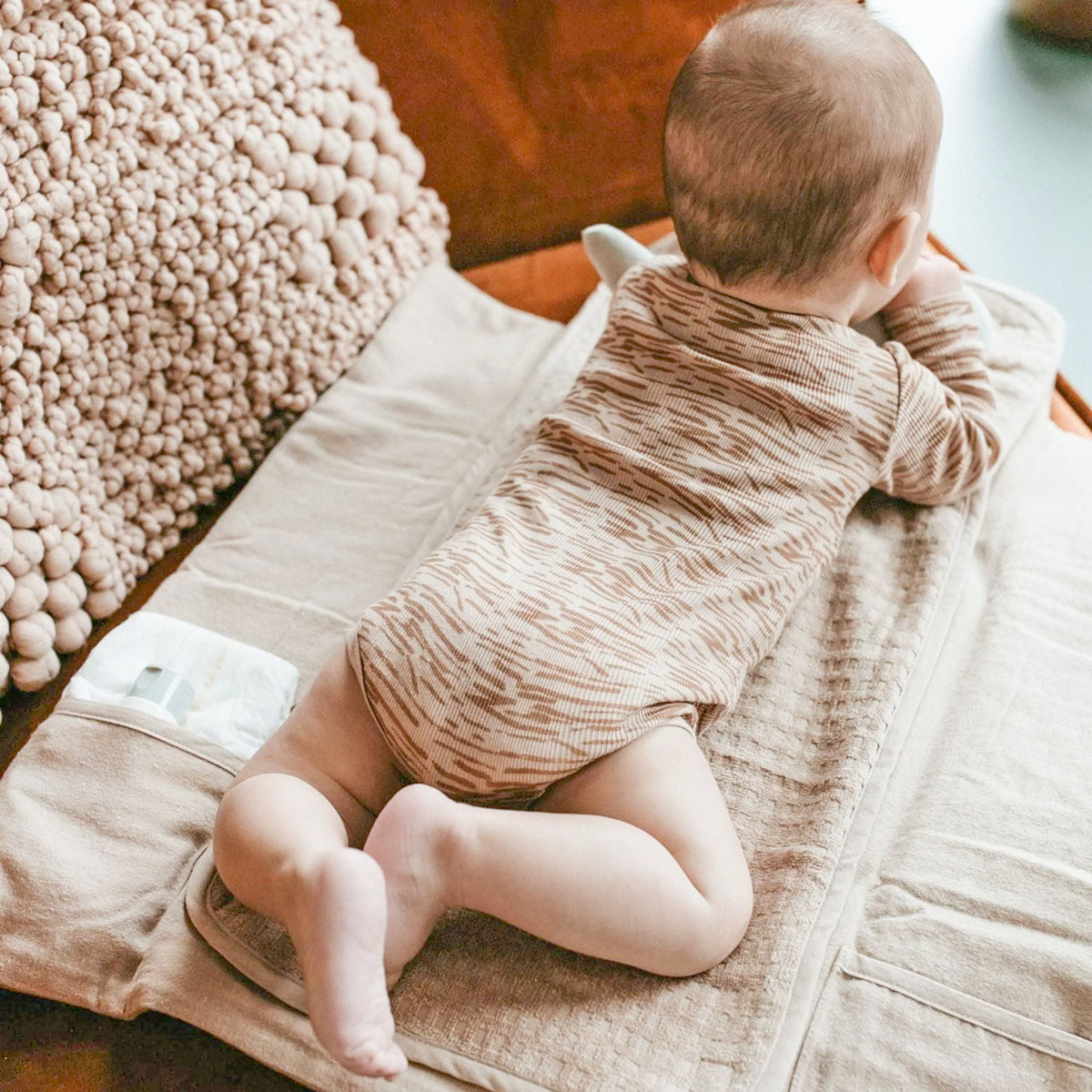 Bebe con cambiador  Arena Snoozebaby | Chin Pum